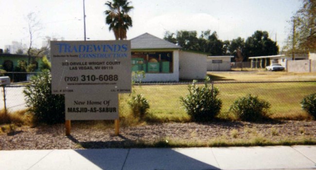 A construction company sign reading &lsquo;New Home of Masjid As-Sabur.&rsquo;